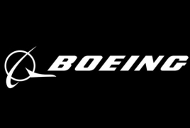 Boeing profit tops expectations, revenue below forecasts