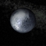Один из полюсов Плутона может быть покрыт полярной ледяной шапкой