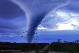 Violent storms sweep north of Germany, trigger tornado