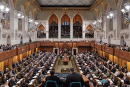 Canada votes to expand spy powers after attack on parliament