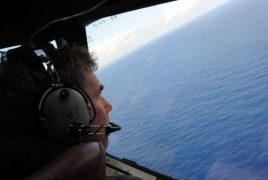 Hunt for missing Malaysian plane discovers uncharted shipwreck