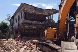 Davutoglu pledges to prevent Armenian orphanage from demolition