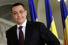 Romania's president urges PM to reign over corruption allegations