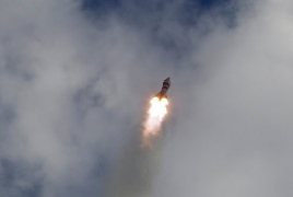 Russian space capsule docks successfully with ISS