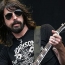 Dave Grohl brings crying fan onstage to perform with him