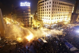 Lebanon PM threatens to resign as protests continue in Beirut