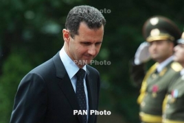 Assad says confident of support from Iran, Russia