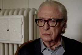 Michael Caine as retired composer in 