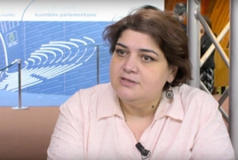 Azeri court sentences corruption-busting journalist to jail