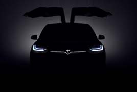 Tesla set to unveil autopilot driving mode in October
