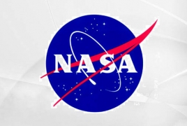 NASA says Pluto has blue skies, surface water ice