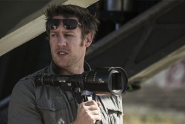 Neill Blomkamp shows off a new Pulse Rifle for his “Alien” film