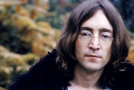 John Lennon's stolen fuitar fetches $2.4 million at auction