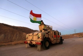 Iraqi Kurds enter Sinjar, raise Kurdish flag in city center