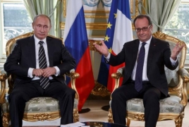 Hollande, Putin agree to work closely to fight Islamic State in Syria