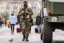 Brussels lowers alert level, terror threat still “possible and likely”