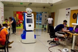 Friendly robot guides passengers at Amsterdam airport