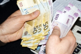 Floating exchange rate devalues Azerbaijani manat by 50%
