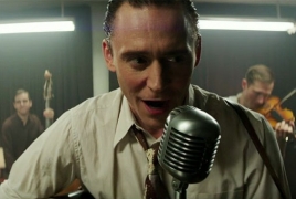 Tom Hiddleston as country music legend in “I Saw the Light” trailer