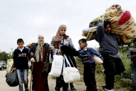 Fighters, civilians escape besieged Syrian areas under UN deal