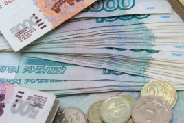 Russian ruble tanks as oil price continues to decline