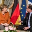 Merkel, Hollande agree refugee crisis needs EU solution