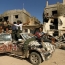 Libya government troops make gains in key town of Benghazi