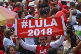 Top judge strips Brazil’s Lula of office for graft probe