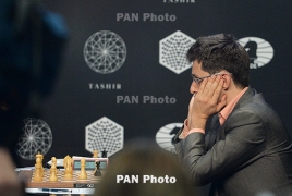 Aronian draws with Chess Candidates leader Karjakin in R13