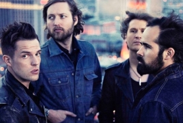 The Killers perform with Imagine Dragons' frontman