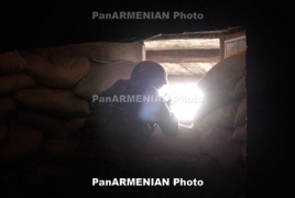 Azeri troops fire from RPG-7 grenade launcher towards Armenian positions