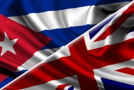 Britain, Cuba talk trade, tourism ties in historic meeting