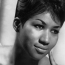 Aretha Franklin pays tribute to Prince with her cover of “Purple Rain”