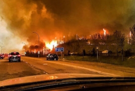 Massive Canada wildfire “to double in size”