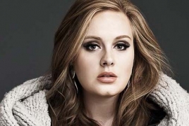Adele previews “Send My Love” music video