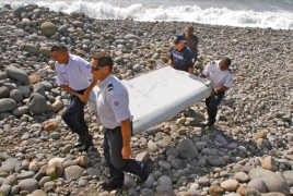 Australia to examine 3 new pieces of debris possibly from flight MH370