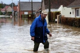 At least 19 killed in floods across Europe, U.S.