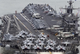 Chinese spy ship shadows U.S. aircraft carrier in the Western Pacific