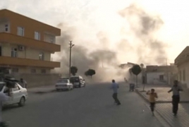 10 killed in car bomb in Kurdish-held Syria town: monitor
