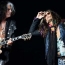 Aerosmith guitarist Joe Perry rushed to hospital after collapsing on stage
