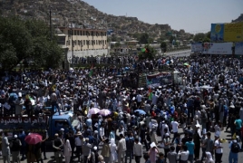 At least 61 killed as powerful blast rips through Kabul protest