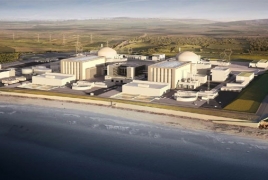 France's EDF Energy backs building Britain nuclear plant but UK delays