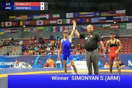 Armenian wrestler defeats Azerbaijani athlete at World Championship