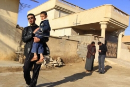 Iraqi militias recruiting children ahead of Mosul push, rights group warns