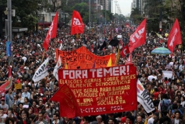 Police use tear gas at massive Brazil anti-government protest