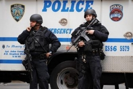 Three dead in U.S. mall shooting, gunman still at large