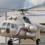 В Сирии боевики ИГ обстреляли российский вертолет с гумпомощью