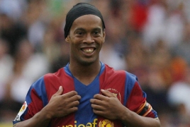 Ronaldinho returns to Barcelona as world ambassador