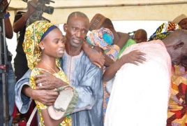21 kidnapped Nigerian “Chibok girls” reunite with families