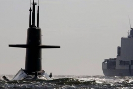 Russian destroyers force away Dutch submarine, defense ministry says